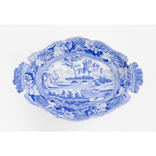 98 - A 19thC Minton blue and white tazza / pedestal dish decorated in the Italian Ruins pattern. Marked u... 