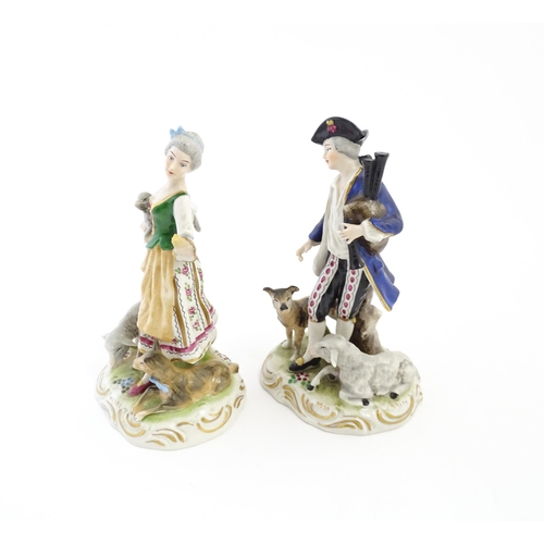 136 - A pair of German figures comprising Shepherd and Shepherdess. Marked under.  Approx. 6 1/2