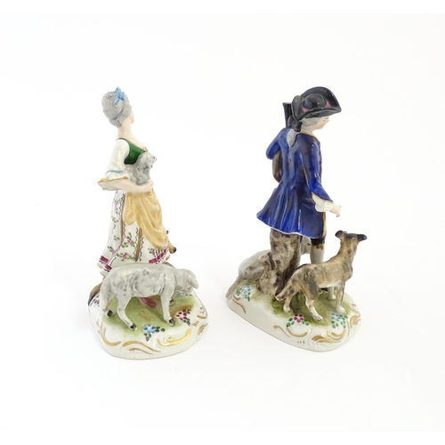 136 - A pair of German figures comprising Shepherd and Shepherdess. Marked under.  Approx. 6 1/2