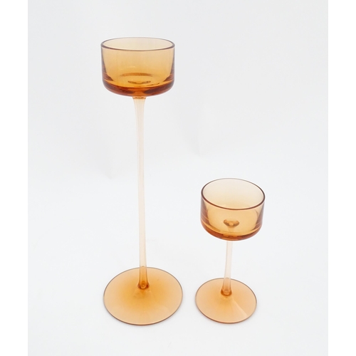304 - A pair of Wedgwood glass Brancaster candlesticks by Ronald Stennett Willson. Largest approx. 11