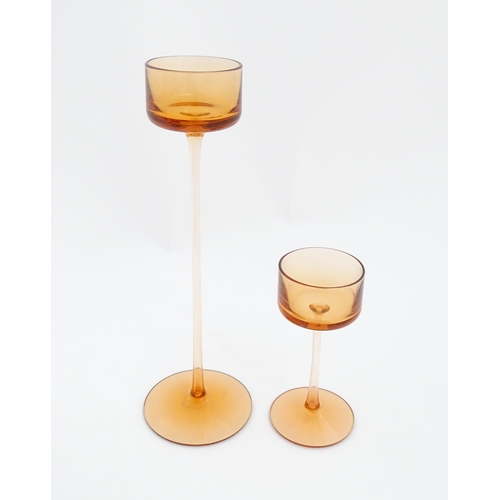 304 - A pair of Wedgwood glass Brancaster candlesticks by Ronald Stennett Willson. Largest approx. 11