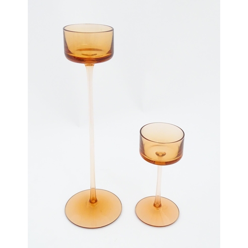 304 - A pair of Wedgwood glass Brancaster candlesticks by Ronald Stennett Willson. Largest approx. 11