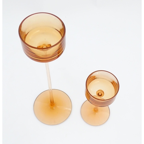 304 - A pair of Wedgwood glass Brancaster candlesticks by Ronald Stennett Willson. Largest approx. 11