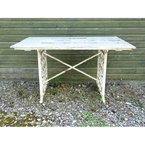 828 - Garden / Architectural: a wrought iron table with painted wooden top, approx 54