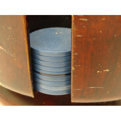 859 - Toys: A 20thC revolving gaming counter /  poker chip stand with two packs of playing cards with clip... 