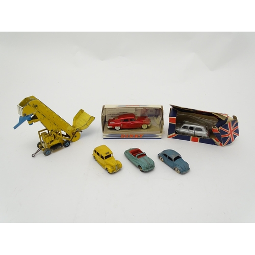 864 - Toys: A quantity of die cast scale model Dinky Toys to include Volkswagen, Austin Taxi, Austin Atlan... 