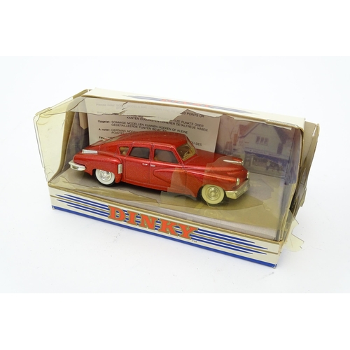 864 - Toys: A quantity of die cast scale model Dinky Toys to include Volkswagen, Austin Taxi, Austin Atlan... 