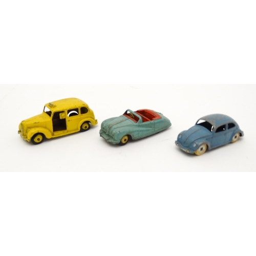 864 - Toys: A quantity of die cast scale model Dinky Toys to include Volkswagen, Austin Taxi, Austin Atlan... 