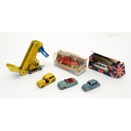 864 - Toys: A quantity of die cast scale model Dinky Toys to include Volkswagen, Austin Taxi, Austin Atlan... 