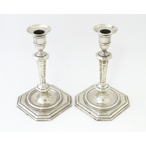 546 - A pair of silver candlesticks hallmarked Sheffield 1927 / 28, maker James Dixon & Sons Ltd. Approx. ... 