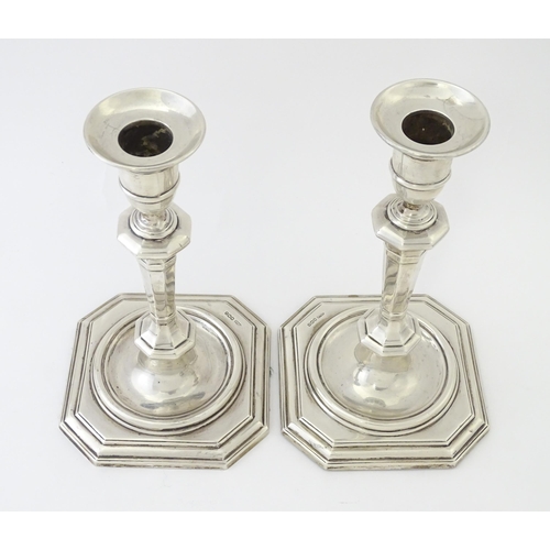 546 - A pair of silver candlesticks hallmarked Sheffield 1927 / 28, maker James Dixon & Sons Ltd. Approx. ... 