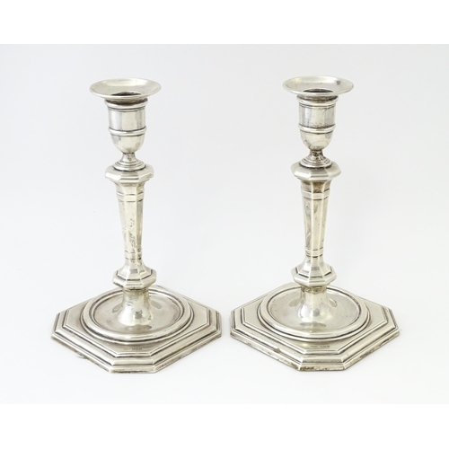 546 - A pair of silver candlesticks hallmarked Sheffield 1927 / 28, maker James Dixon & Sons Ltd. Approx. ... 