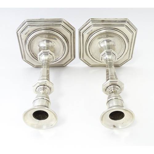 546 - A pair of silver candlesticks hallmarked Sheffield 1927 / 28, maker James Dixon & Sons Ltd. Approx. ... 