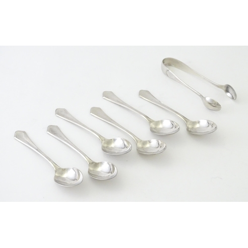 564 - A cased set of six silver teaspoons with sugar tongs en suite, hallmarked Birmingham 1929, maker Bar... 