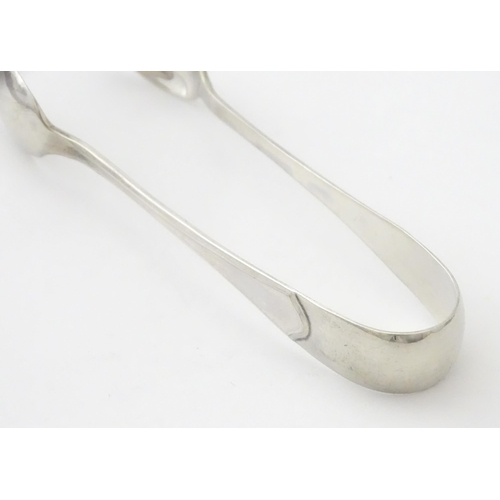 564 - A cased set of six silver teaspoons with sugar tongs en suite, hallmarked Birmingham 1929, maker Bar... 