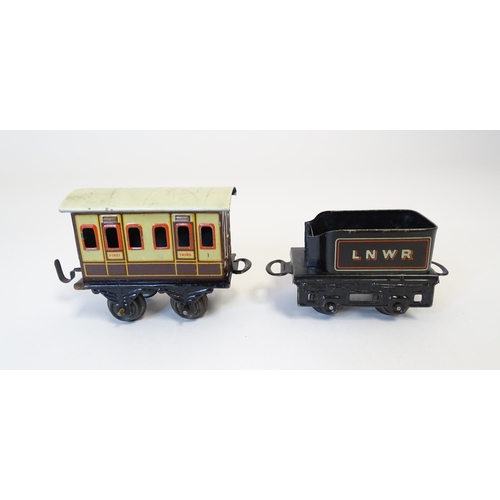 855 - Toys - Railway / Train Interest : A Bing tinplate clockwork train set comprising a locomotive, two t... 