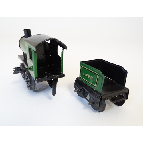 855 - Toys - Railway / Train Interest : A Bing tinplate clockwork train set comprising a locomotive, two t... 