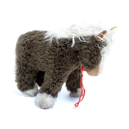 856 - Toy: A 20thC Steiff Cosy Pony, plush horse toy. Approx. 8