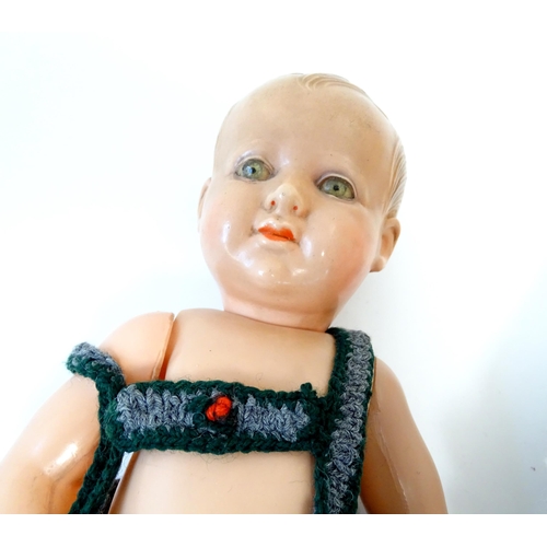 863 - Toys: Two 20thC German Schildkrot plastic dolls with articulated arms and legs. Together with a Fren... 