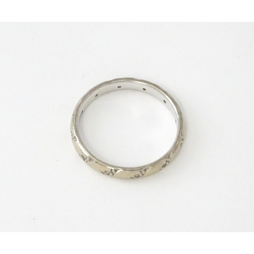 630 - An 18ct white gold ring set with diamonds. Ring size approx. N