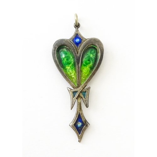 An Art Nouveau silver pendant with enamel decoration. hallmarked Chester 1910.  Approx. 2" long