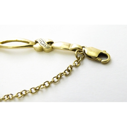 673 - A 9ct gold bracelet set with diamonds. Approx 7 1/2