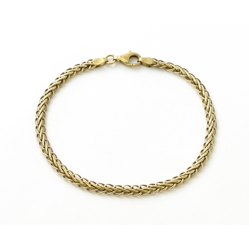 674 - A 9ct gold bracelet. Approx.7 1/2