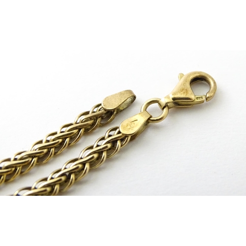 674 - A 9ct gold bracelet. Approx.7 1/2