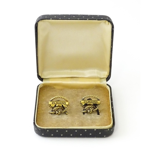 681 - A pair of silver gilt Cunard cufflinks with rope twist detail and set with a diamond. Approx. 5/8