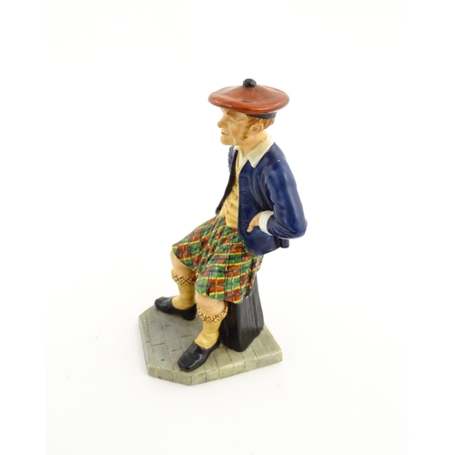 108 - A Royal Worcester figure Sandy / The Scotsman no. 913, modelled by James Hadley 1881. Marked under. ... 