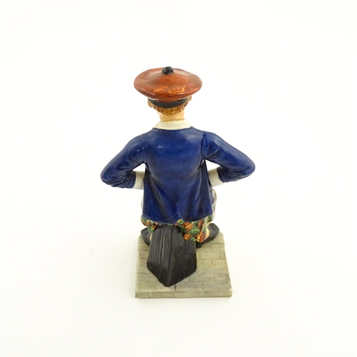 108 - A Royal Worcester figure Sandy / The Scotsman no. 913, modelled by James Hadley 1881. Marked under. ... 