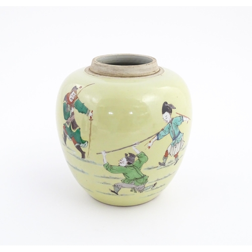 1 - A Chinese famille rose ginger jar with a pale yellow ground decorated with warrior figures. Approx. ... 