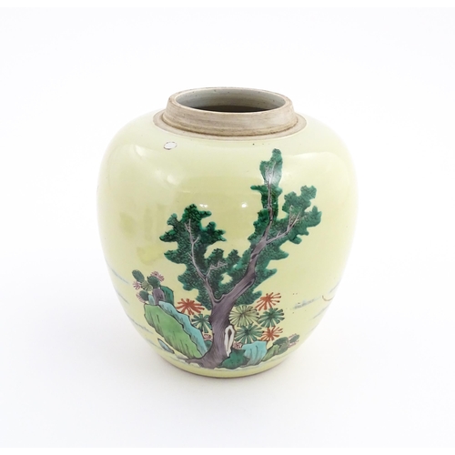 1 - A Chinese famille rose ginger jar with a pale yellow ground decorated with warrior figures. Approx. ... 