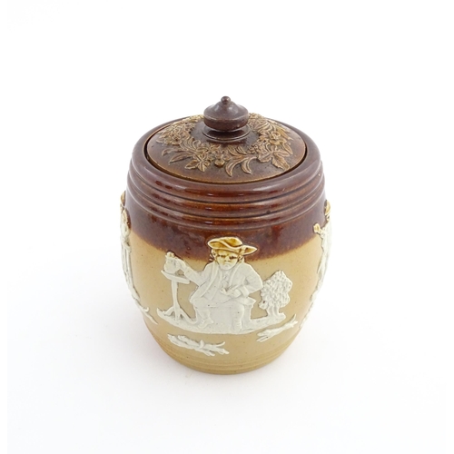 110 - A Royal Doulton two tone stoneware tobacco pot / jar with applied hunting decoration. Marked under a... 