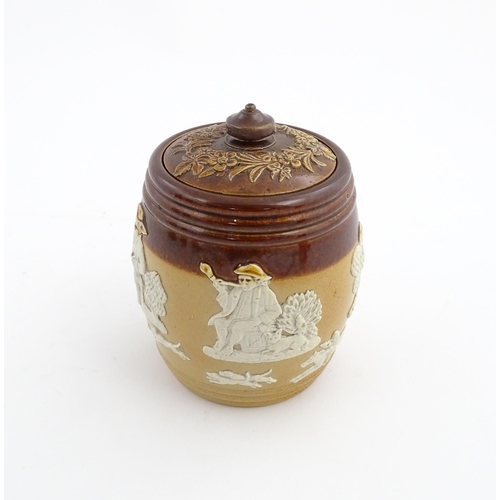 110 - A Royal Doulton two tone stoneware tobacco pot / jar with applied hunting decoration. Marked under a... 