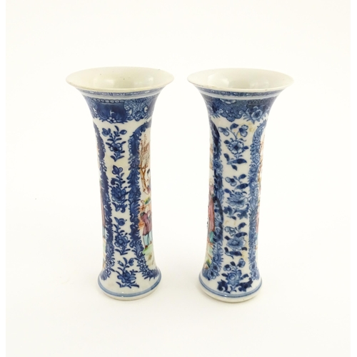 13 - A pair of Chinese vases of cylindrical form with flared rims, with panelled decoration depicting fig... 