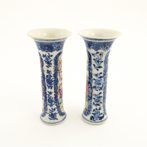 13 - A pair of Chinese vases of cylindrical form with flared rims, with panelled decoration depicting fig... 