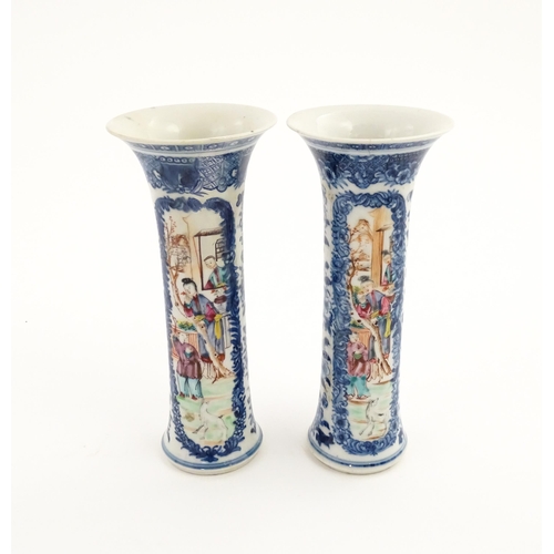 13 - A pair of Chinese vases of cylindrical form with flared rims, with panelled decoration depicting fig... 