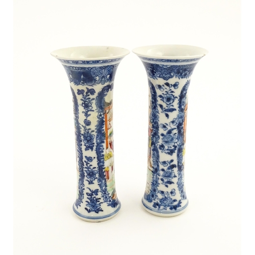 13 - A pair of Chinese vases of cylindrical form with flared rims, with panelled decoration depicting fig... 