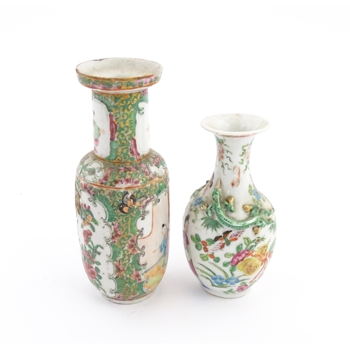 28 - Two Chinese / Cantonese famille rose vases decorated with figures, flowers and foliage, one with rel... 