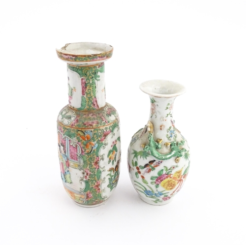 28 - Two Chinese / Cantonese famille rose vases decorated with figures, flowers and foliage, one with rel... 