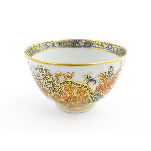 157A - A New Hall tea bowl decorated in the Tobacco Leaf pattern. Approx. 2