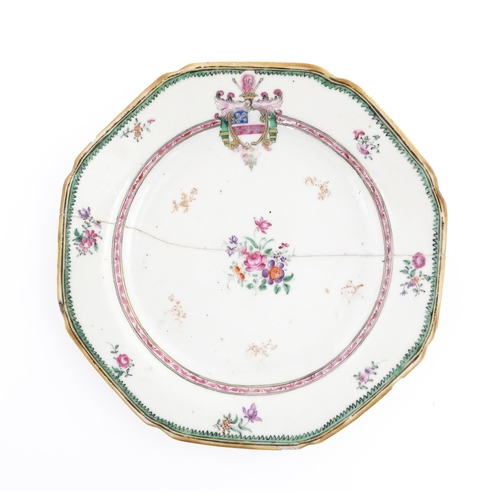 33 - A Chinese export dish of octagonal form decorated with an armorial, flowers and foliage. Approx. 6 1... 