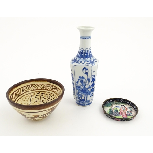 34 - Three Chinese items comprising a small blue and white vase with floral and foliate decoration, a stu... 