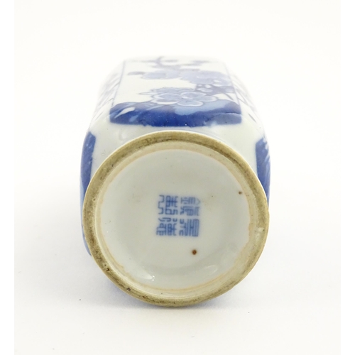 34 - Three Chinese items comprising a small blue and white vase with floral and foliate decoration, a stu... 