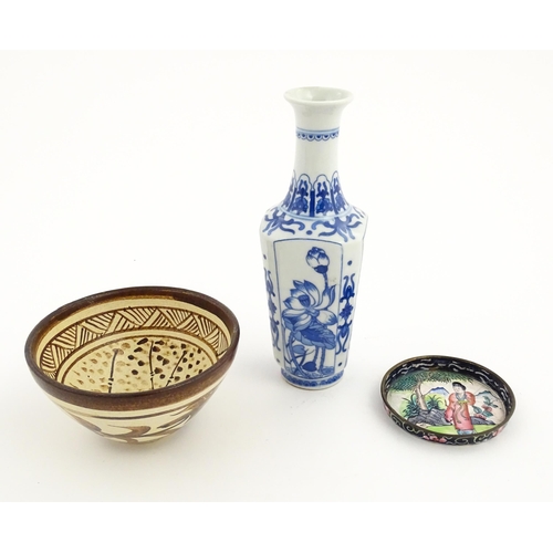 34 - Three Chinese items comprising a small blue and white vase with floral and foliate decoration, a stu... 