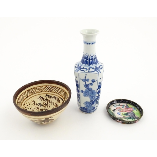 34 - Three Chinese items comprising a small blue and white vase with floral and foliate decoration, a stu... 