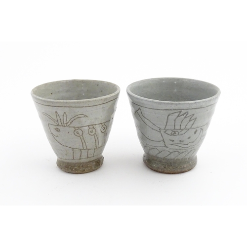 42 - Four items of Japanese studio pottery each with hand drawn decoration depicting mythical creatures. ... 