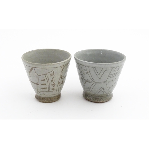 42 - Four items of Japanese studio pottery each with hand drawn decoration depicting mythical creatures. ... 