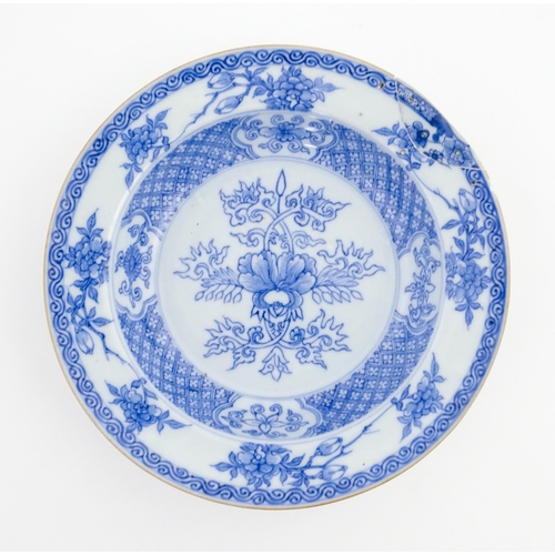 52 - A quantity of assorted Oriental items to include a Chinese export blue and white dish decorated with... 